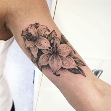 Black white lily tattoos. Things To Know About Black white lily tattoos. 
